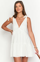 Beginning Boutique Angel Girl White Mini Dress white deep V-neck tie-shoulder mini dress with a fitted bodice and tiered skir