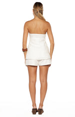 Rear view of white floral embroidered shorts with a relaxed fit