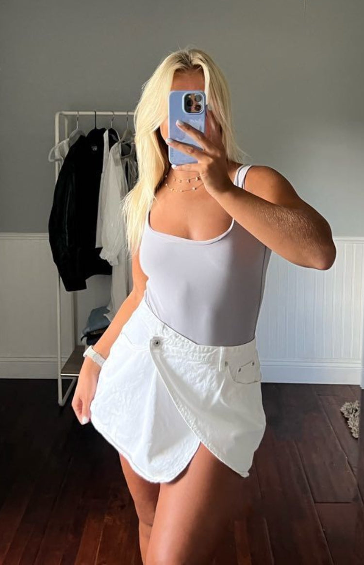 Alcmene White Denim Asymmetrical Wrap Mini Skirt | Beginning