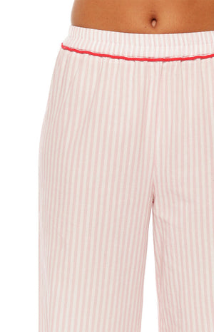 Close-up showing the elasticated waistband and red piping detail on pink stripe pajama pants