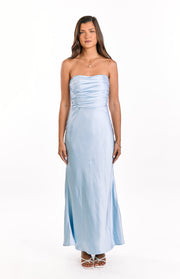 Front view of a light blue strapless maxi dress with a ruched bodice and flowing skirt