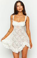 Beginning Boutique All Mine White Lace Mini Dress white floral lace sweetheart neckline mini dress with wide straps and ruffled hem