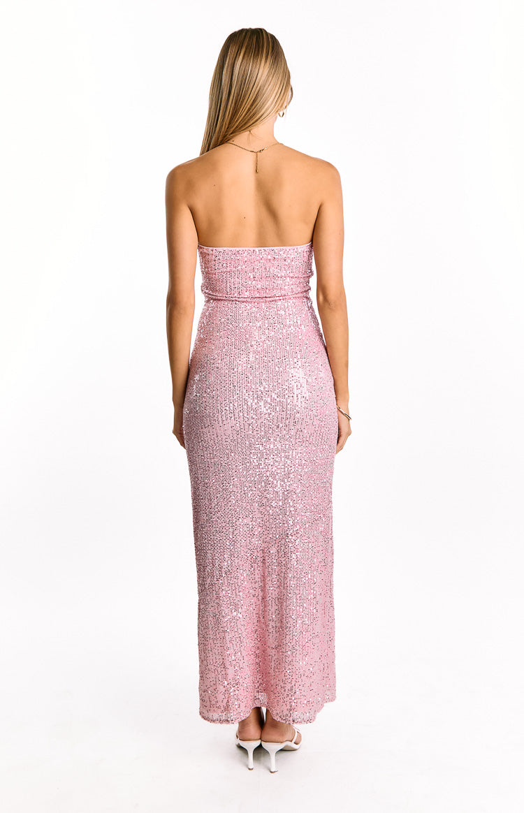 Rear view of a pink sequin strapless maxi dress showing the fitted silhouette and a subtle waist band