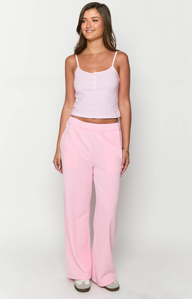 Cropped pink and white striped singlet with thin spaghetti straps and a three-button placket
