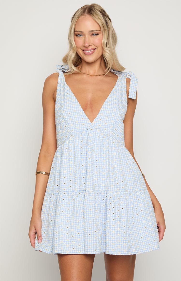 Front view of a blue gingham floral mini dress with a deep V-neckline and tie-shoulder straps