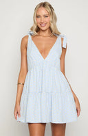 Beginning Boutique Angel Girl Blue Gingham Floral Mini Dress blue gingham V-neck mini dress with tie shoulders and tiered ski