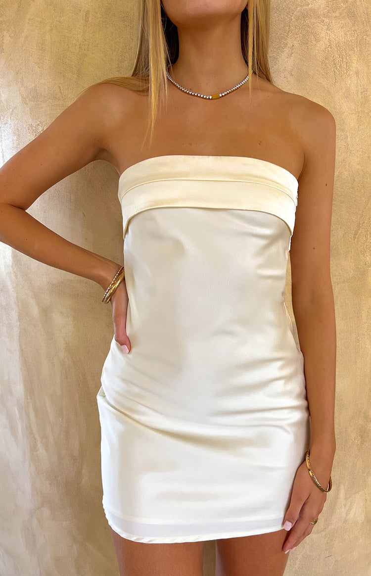 Cream strapless satin mini dress with a folded band detail at the bust