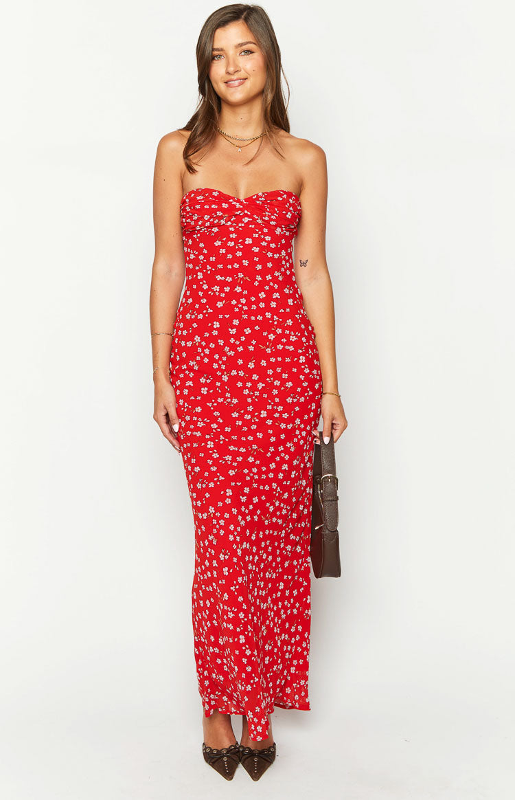 Front view of a red floral strapless maxi dress with a ruched sweetheart neckline and a fitted silhouette