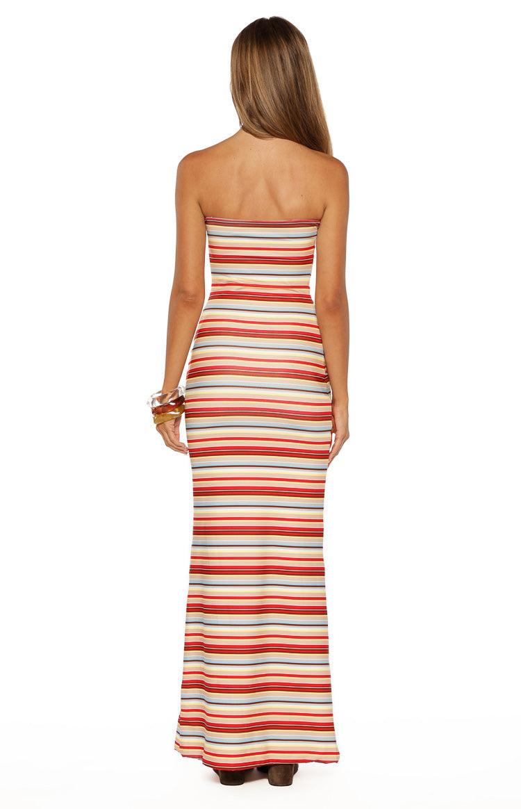 Rear view of a beige multi stripe strapless bodycon maxi dress with horizontal stripes