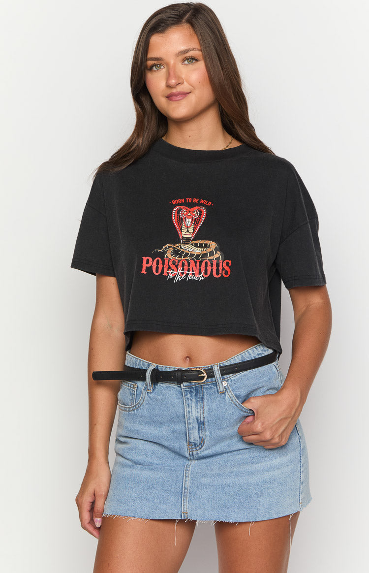 Washed black cotton crop tee with red cobra snake graphic and "Poisonous to the touch" text