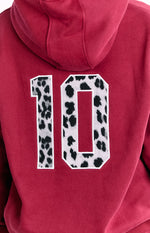Beginning Burgundy Leopard Star Hoodie Image