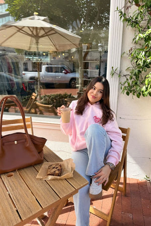 Beginning Boutique Beginning Pink Lovey Bubble Hoodie light pink oversized hoodie with a hood, long sleeves, and a pink heart