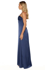 Side view of a navy satin maxi dress with a draped bodice and flowy skirt