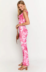 Side view of the pink and white floral maxi dress showing the fitted silhouette and cowl neckline