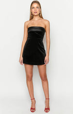 Black velvet strapless mini dress with a straight neckline and bodycon fit