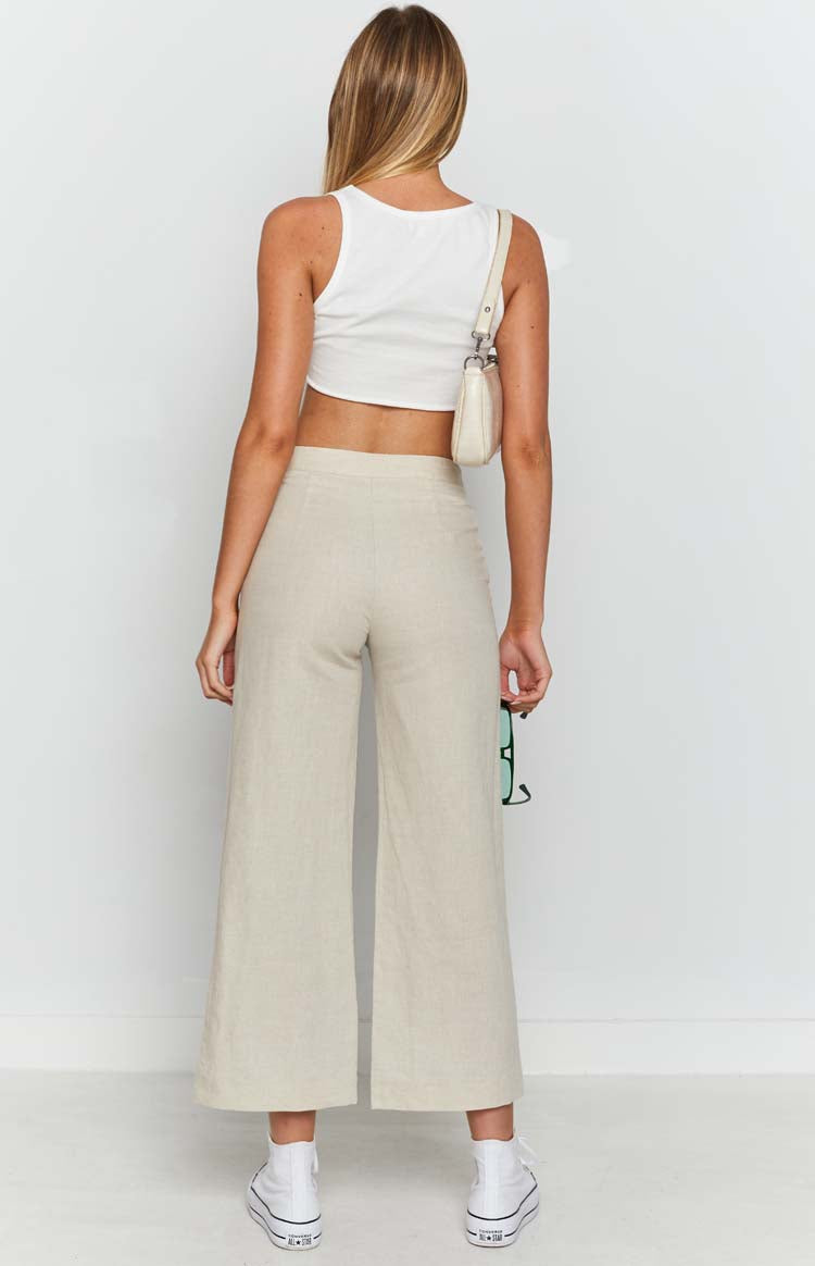 Beige linen blend wide-leg pants with a smooth back waistband and cropped length