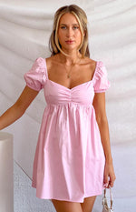 Pink babydoll mini dress with a square neckline, ruched bust, and short puff sleeves
