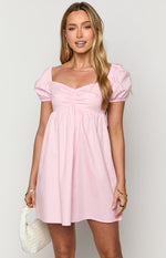 Front view of a pink mini dress with a ruched sweetheart neckline and short puff sleeves