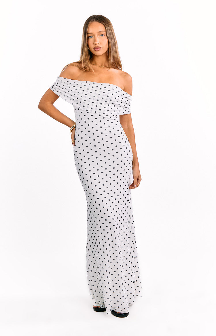 White polka dot mesh maxi dress with an off-shoulder neckline and draped short sleeves