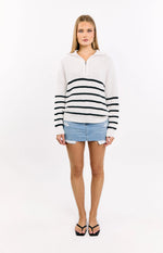 Textured cream knit jumper with black stripes and a partially unzipped quarter zip collar