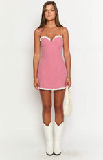 Fitted red gingham mini dress with a sweetheart neckline, thin straps, and white lace trim