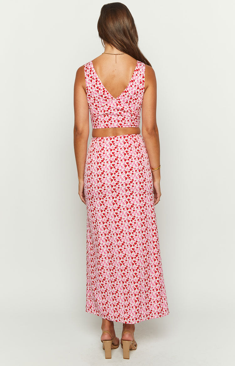 Rear view of the pink and red speckled crop top with a V-neck back and cropped hem
