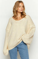 Beginning Boutique Delvey Cream Chunky Knit Sweater cream oversized chunky knit sweater with a wide V-neck, dropped shoulders
