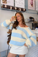 Beginning Boutique Delvey Light Blue Striped Chunky Knit Sweater cream striped chunky knit with wide V-neck and balloon sleev