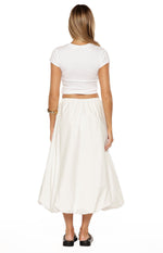 Rear view of the white bubble hem skirt with an elasticated waist and voluminous silhouette