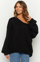 Beginning Boutique Delvey Black Chunky Knit Sweater black chunky knit oversized sweater with a V-neck and long sleeves