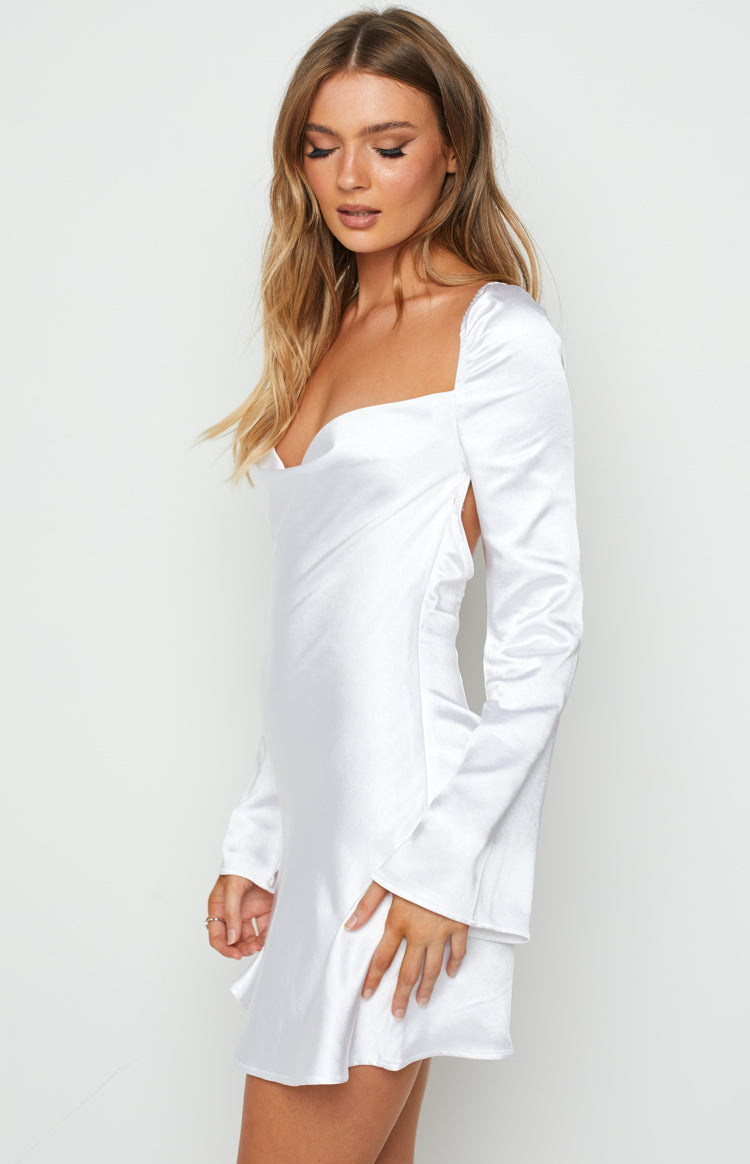 Side view of a white satin mini dress with a draped cowl square neckline, long flared sleeves, and side cutout