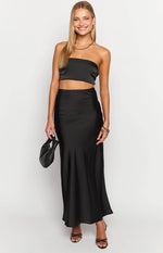 Black satin high-waisted maxi skirt with a flowy A-line silhouette