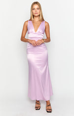 Front view of a purple satin maxi dress with a deep V-neckline, wide shoulder straps, and a ruched waist