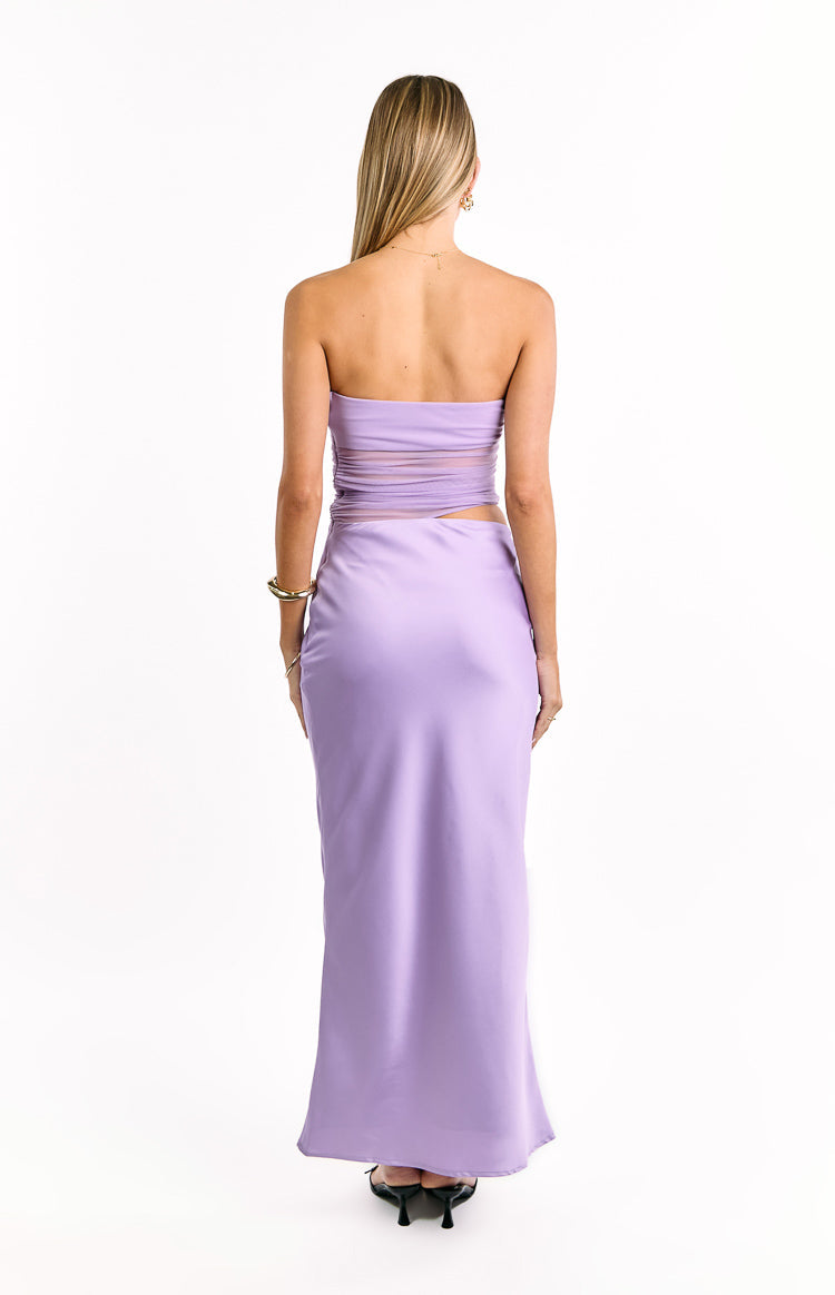 Rear view of a lilac satin maxi dress with a strapless top, sheer mesh panels on the back, and a cutout waist detail