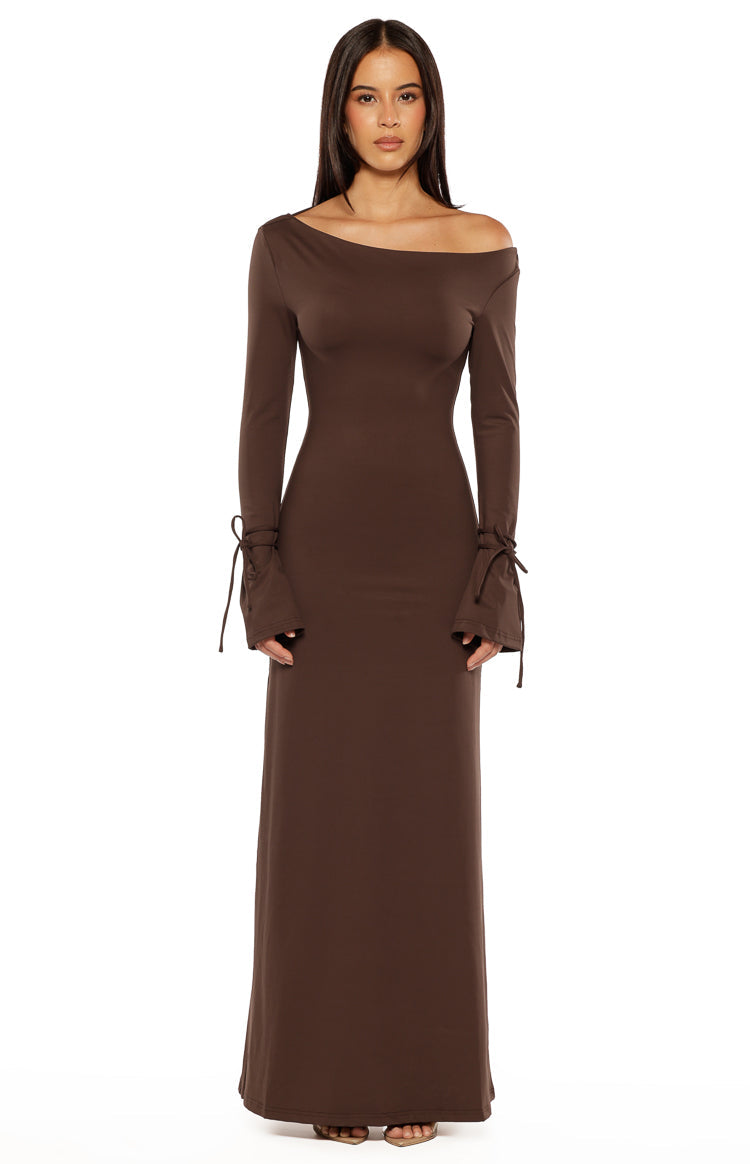 Chocolate jersey maxi dress with an off-shoulder neckline and long sleeves with tie details at the cuffs