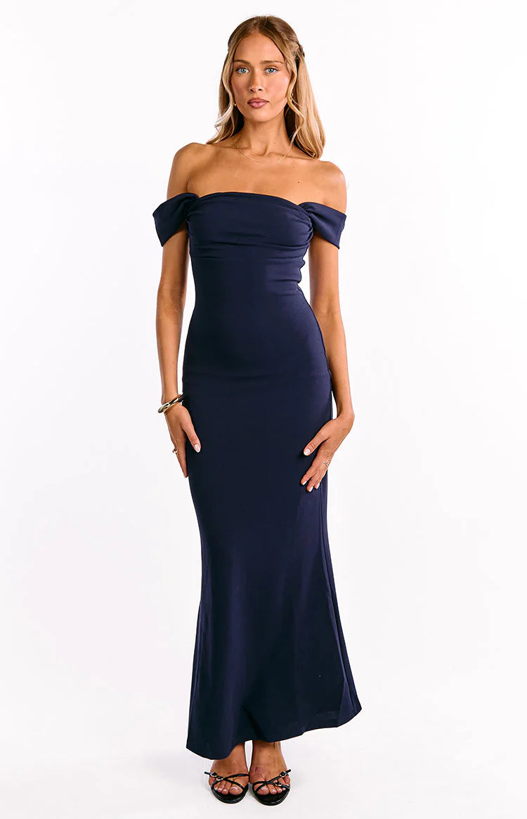 Navy off-shoulder crepe maxi dress with a sweetheart neckline, fitted bodice, and a gently flared hem