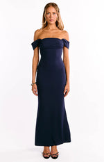 Navy crepe maxi dress with a fitted bodycon silhouette and draped off-shoulder sleeves