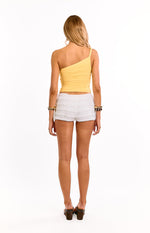 Rear view of a yellow ruched one shoulder top with a single strap and fitted silhouette