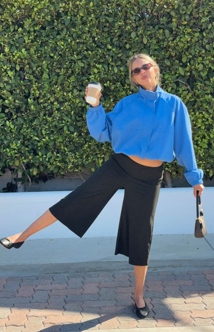 Cobalt blue funnel neck sports jacket with a cropped length and relaxed fit
