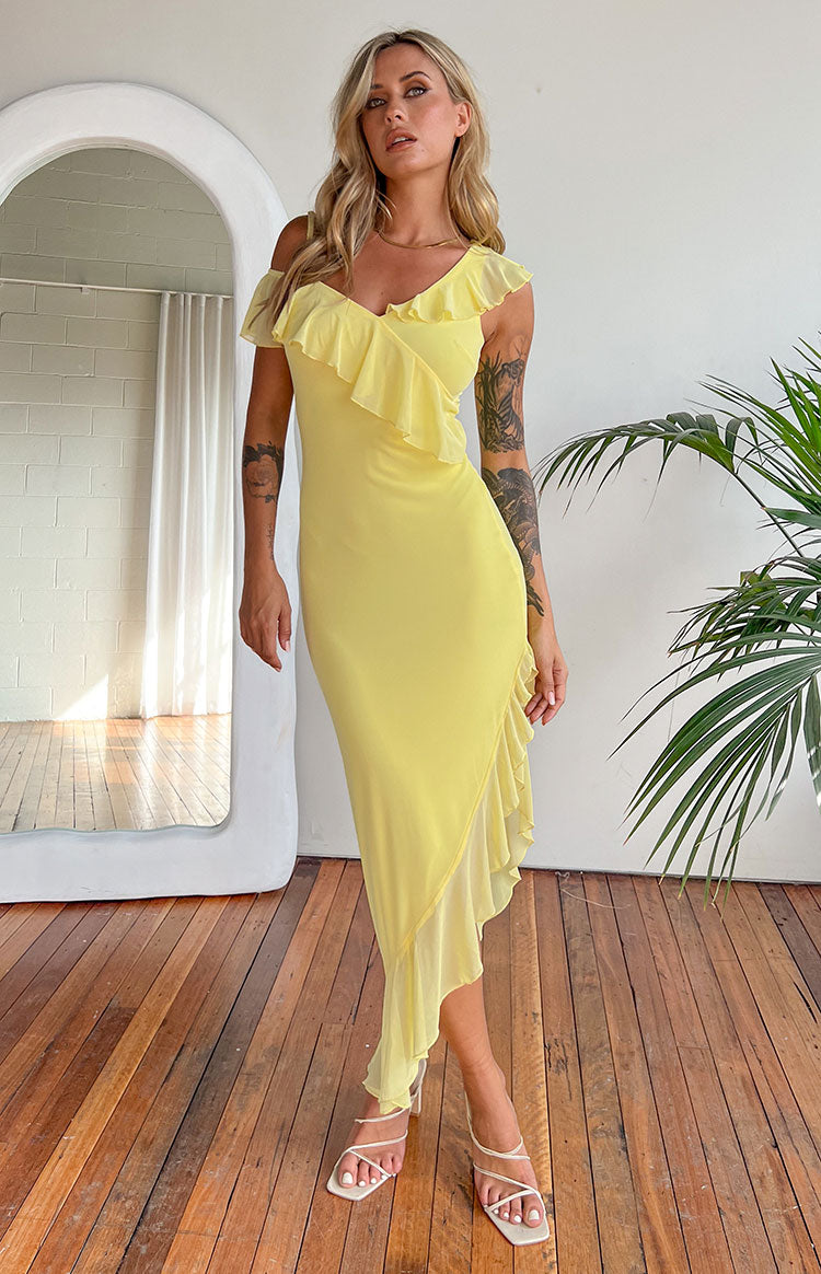 Yellow mesh midi dress with a V-neckline, one off-shoulder ruffle, and an asymmetrical ruffle hem