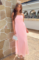 Pink maxi dress with a straight ruched neckline, thin spaghetti straps, and side tie ruching