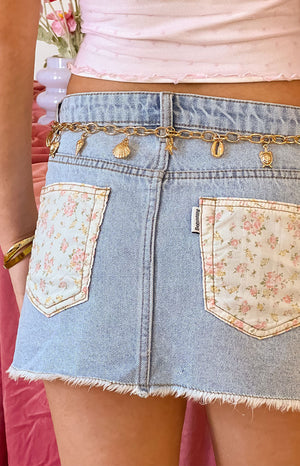 Beginning Boutique Found Love Floral Light Wash Denim Skirt light wash denim mini skirt with distressed pockets frayed hem an