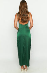 Rear view of an emerald satin maxi dress with a low scoop back, thin spaghetti straps, and a visible zipper closure