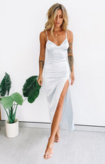 Ice blue silky formal dress with a sweetheart neckline, thin spaghetti straps, and a high side slit