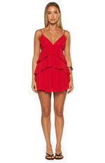 Front view of a red mini dress with a V-neckline, thin straps, and a tiered ruffle skirt