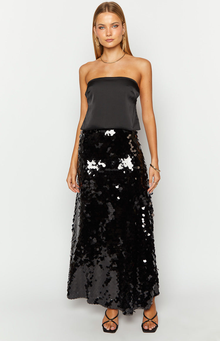 Front view of a black sequin maxi skirt with a relaxed A-line fit and all-over large round sequins