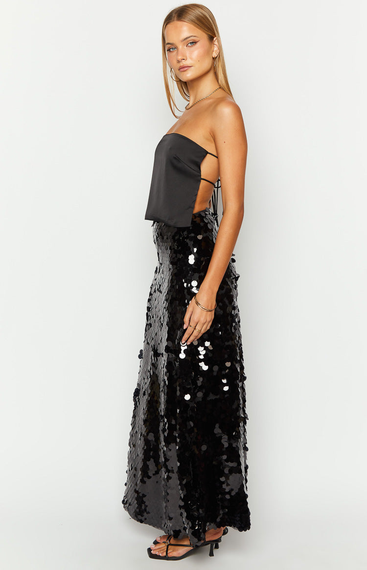Side view of the black sequin maxi skirt, showing the full length and the all-over shimmering black sequins