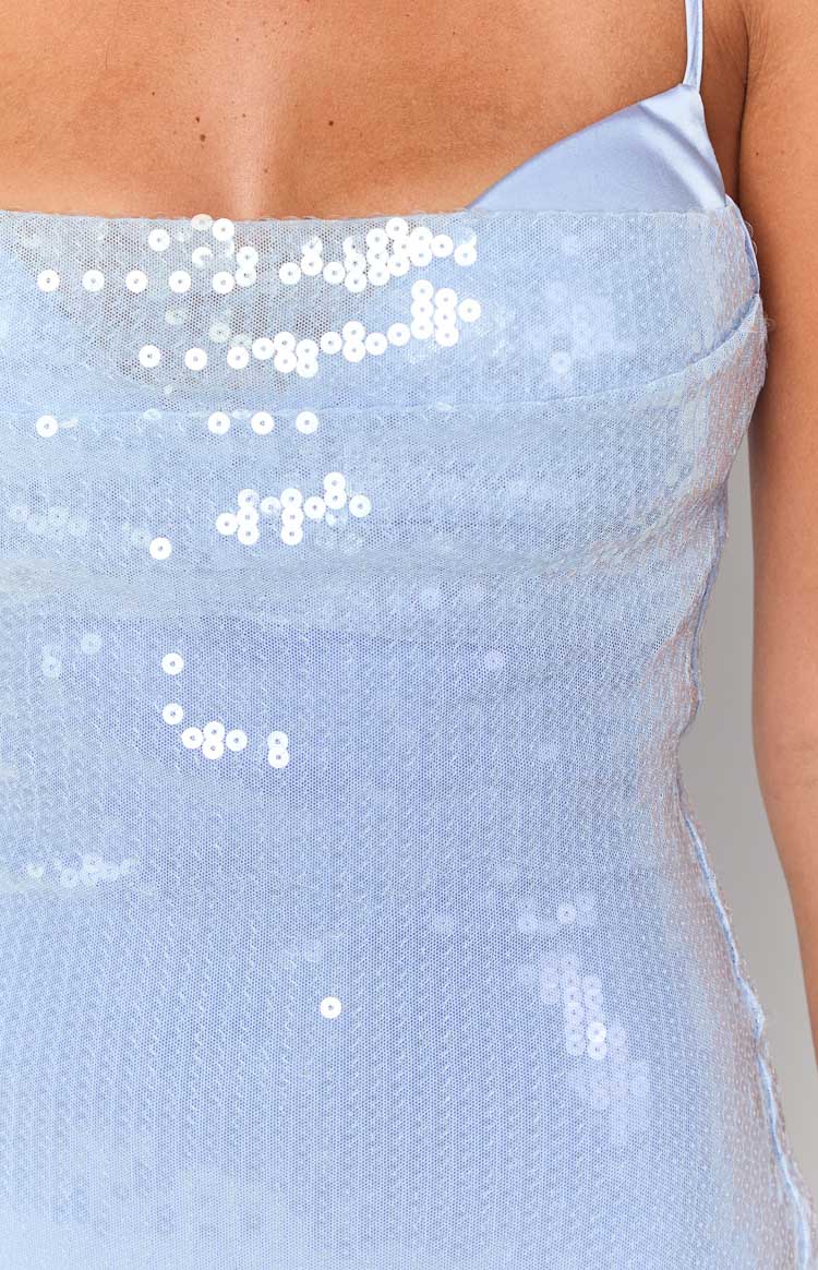 Close-up of the light blue sequin fabric and cowl neckline with satin lining of the maxi dress