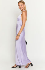 Side view of a purple satin maxi dress with a halter neckline and ruched bust