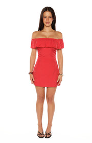 Red polka dot off-shoulder mini dress with a ruffled neckline and fitted silhouette